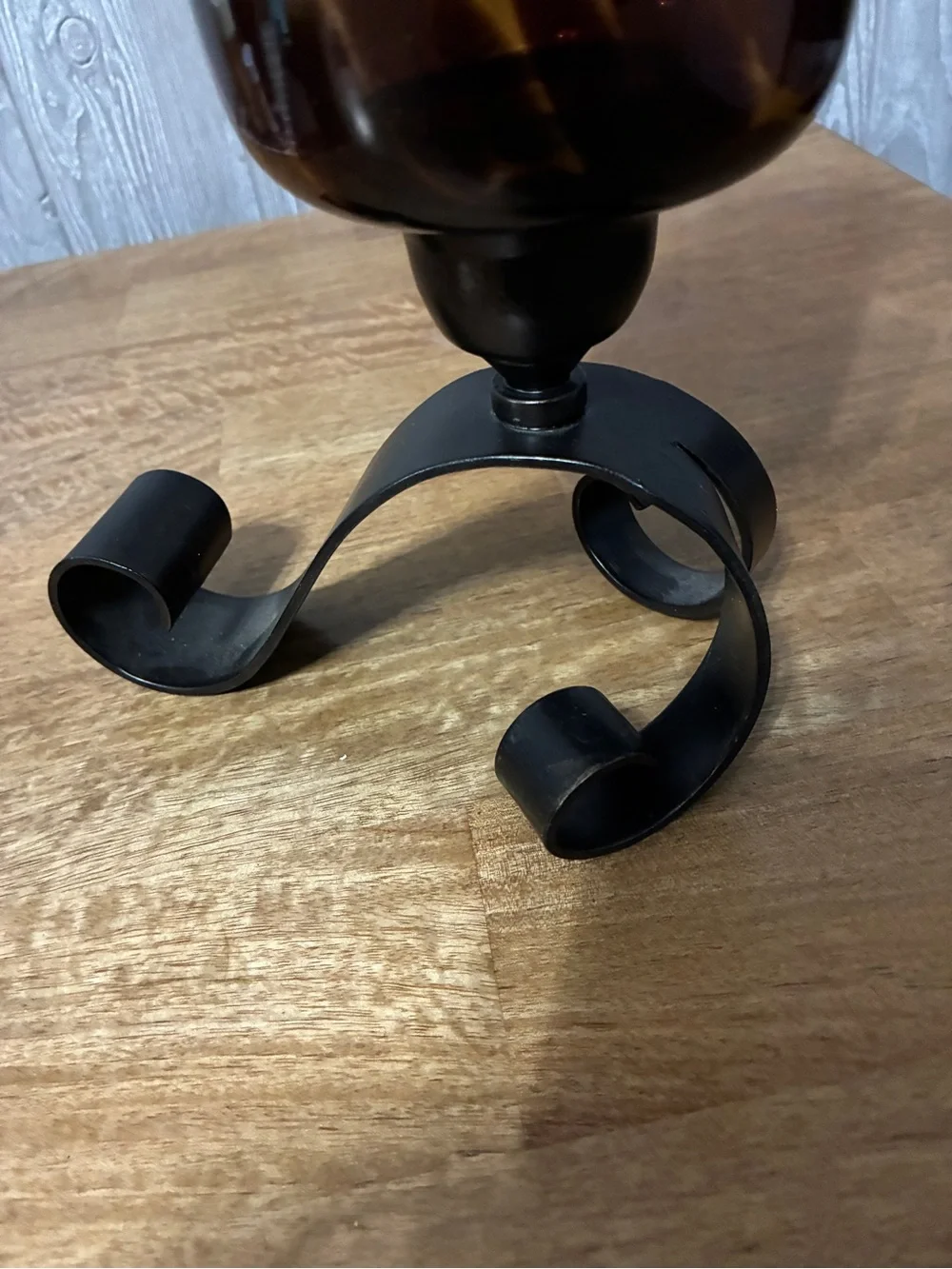 Amber Glass Hurricane Candle Holder with Black Scroll Base 11” x7”